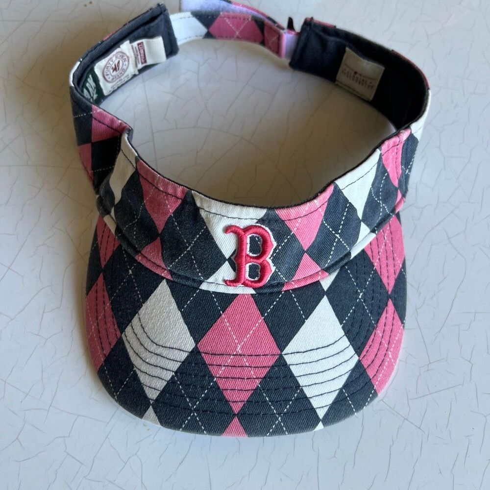 Boston Red Sox adjustable sun visor featuring a pink and black argyle pattern.